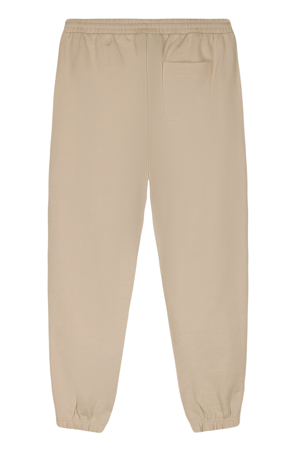 Mock-up d'un jogging pour femme en coton bio sable, imprimé blanc de l'inscription "be your own definition of beauty" à l'avant. Modèle Sekhmet, conçu et imprimé à Lyon par la marque éthique Leonor Roversi