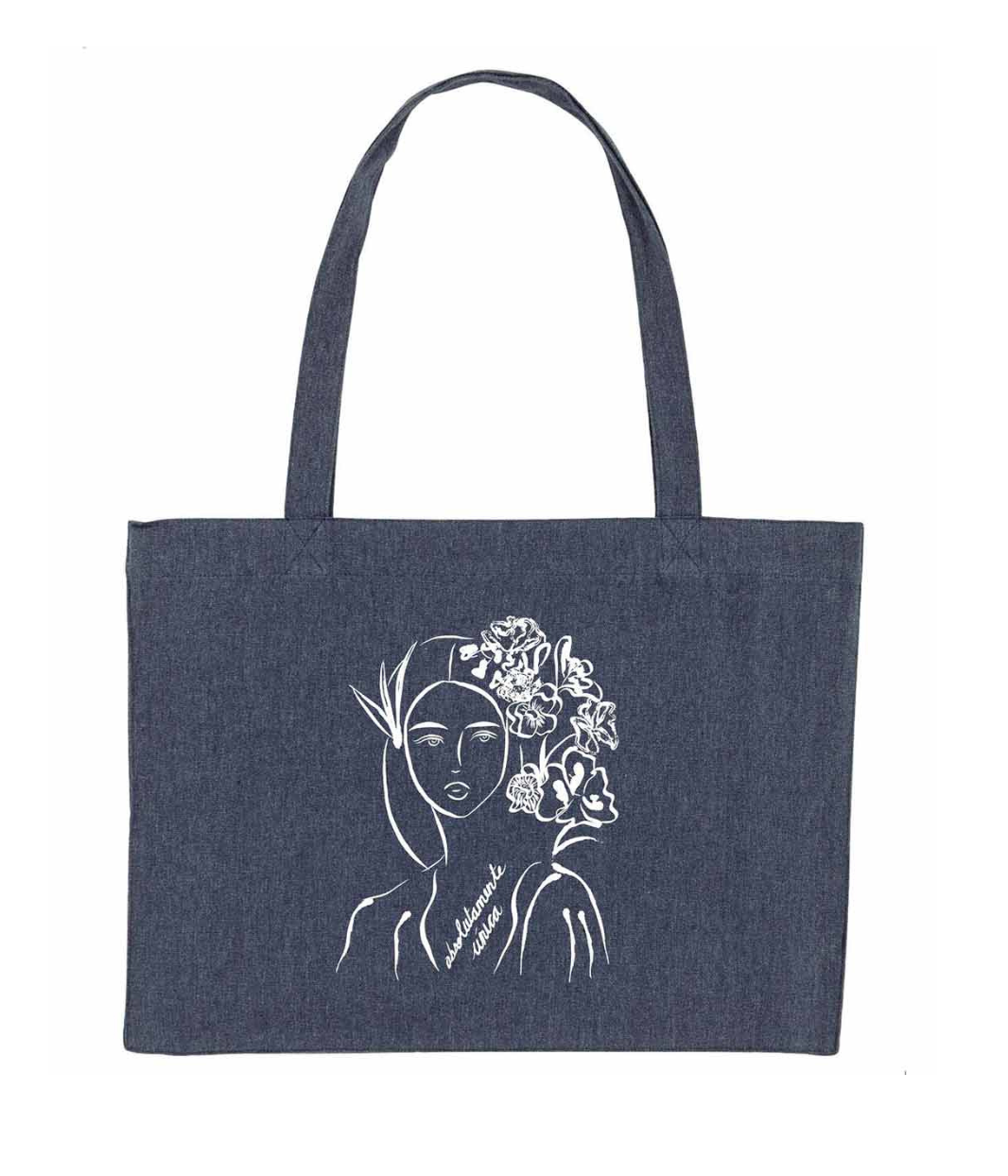 Cabas Denim avec imprimé rose illustrant une silhouette féminine avec des fleurs suivi de l'inscription "absolumente única". Modèle Unica, conçu et imprimé à Lyon par la marque éthique Leonor Roversi.