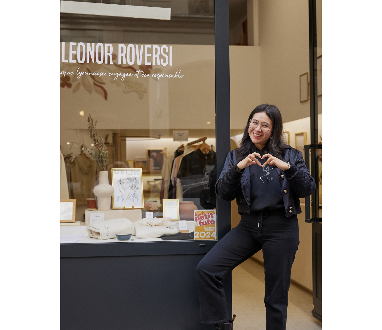 Gabriela, créatrice de la marque lyonnaise et éthique de prêt-à-porter Leonor Roversi, devant sa boutique à Lyon.