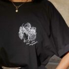 Zoom sur le t-shirt noir Conquérante, Coton Bio leonor roversi